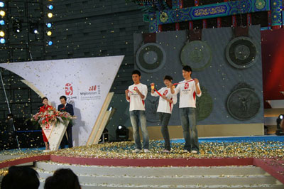 Models showcase Beijing Olympic medals at the unveiling ceremony of the Beijing 2008 Olympic medals in Captital Museum, March 27, 2007. 