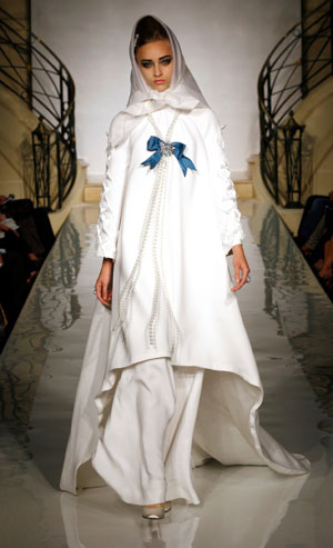 A model presents a creation by French designer Pascal Millet for Carven as part of his Autumn/Winter 2007-2008 Haute Couture fashion show in Paris, July 4, 2007.